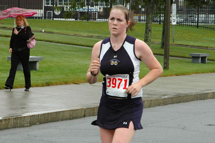 Boston Globe:  "Massachusetts Maritime Runner Sacrifices Good Showing To Help Another"