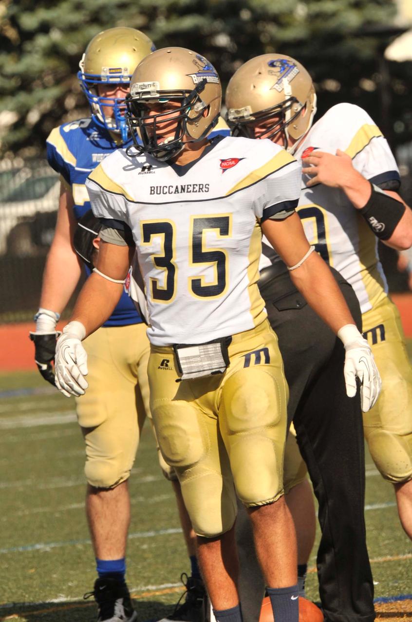 Gustafson Cracks 100 Yard Mark On Ground, Andrade Records 12 Tackles As Football Succumbs In Second Half To Bridgewater State In 35th Annual Cranberry Bowl