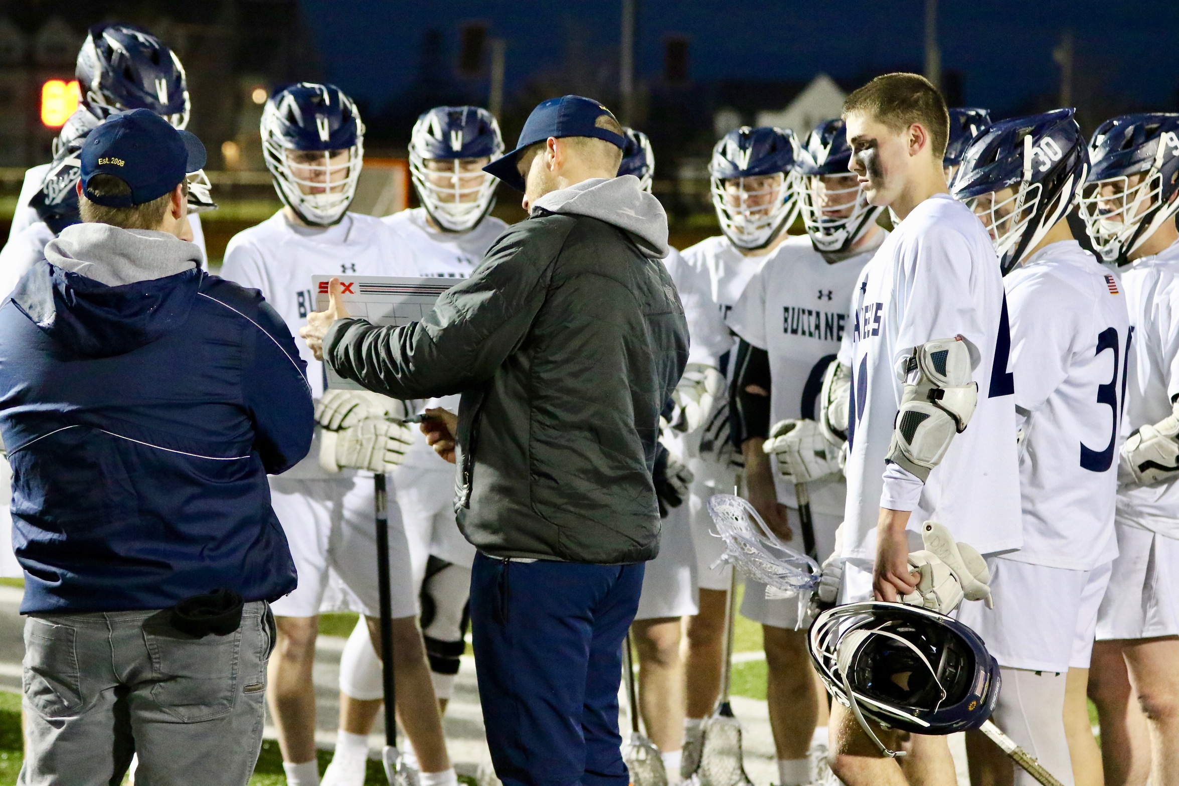 Bucs Beaten By Beacons in Boston in Close Conference Contest